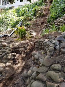 Old Mission Hills sewer pipes going downhill into the canyon